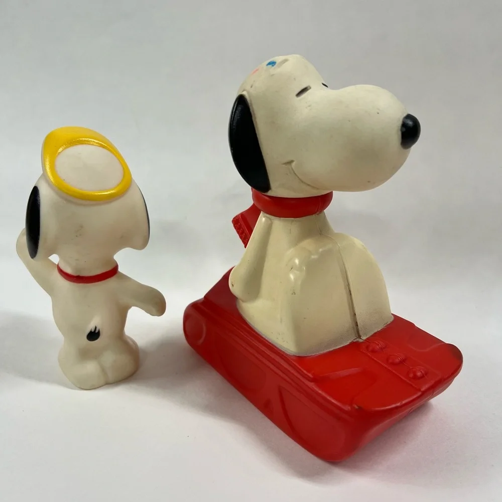 Vintage Snoopy Sled 1972 Avon Bubble bath with Red Base & snoopy Squeaker Toy